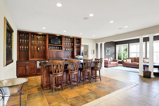 7635 Monte Carlo Way, Indianapolis, IN 46278 - indoor wet bar featuring decorative columns and recessed lighting