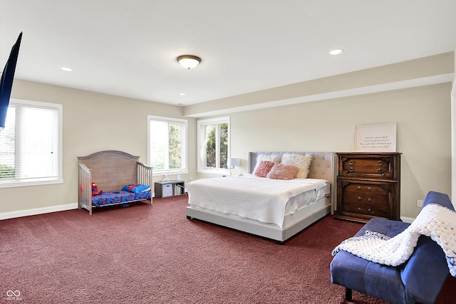 7635 Monte Carlo Way, Indianapolis, IN 46278 - bedroom featuring dark colored carpet, multiple windows, and recessed lighting