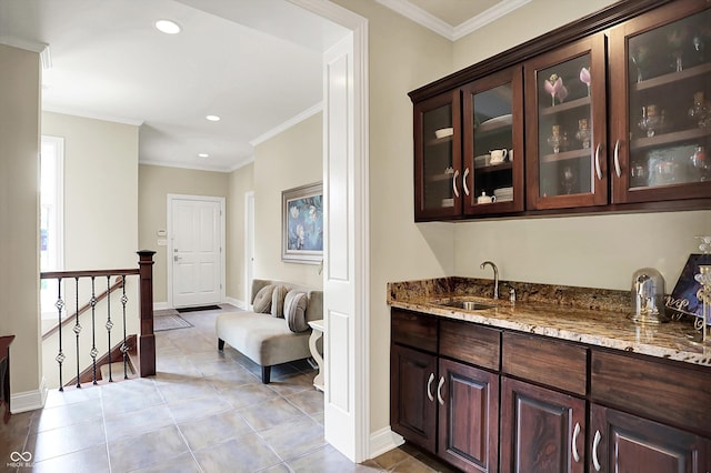 7635 Monte Carlo Way, Indianapolis, IN 46278 - indoor wet bar featuring light tile patterned floors, crown molding, and recessed lighting