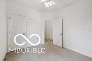 19146 Carol Cove Cir, Noblesville, IN 46062 - unfurnished bedroom featuring a ceiling fan