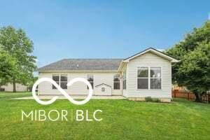 19146 Carol Cove Cir, Noblesville, IN 46062 - back of property featuring a lawn