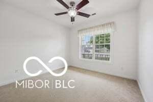 19146 Carol Cove Cir, Noblesville, IN 46062 - unfurnished room with baseboards, carpet, and ceiling fan