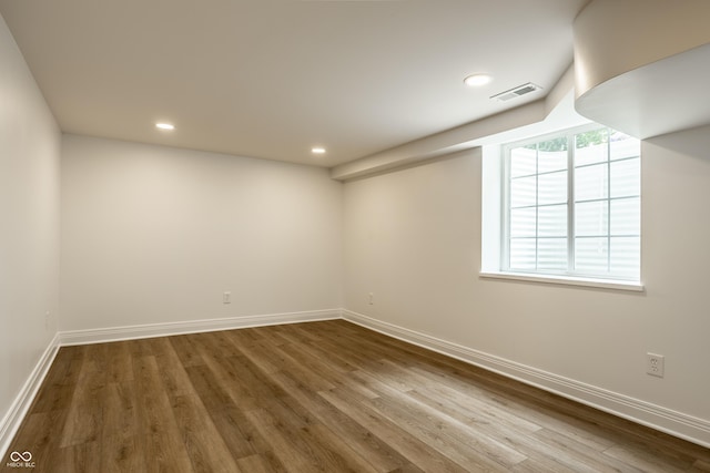 7105 Sylvan Ridge Rd, Indianapolis, IN 46240 - empty room with wood finished floors, baseboards, and recessed lighting