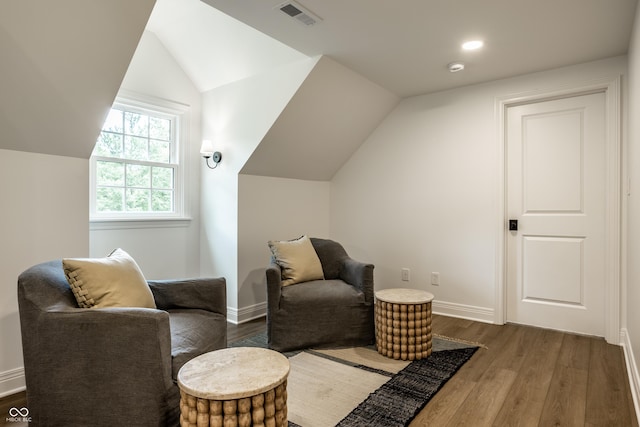 7105 Sylvan Ridge Rd, Indianapolis, IN 46240 - sitting room with lofted ceiling, dark wood finished floors, and baseboards
