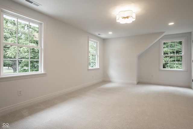 7105 Sylvan Ridge Rd, Indianapolis, IN 46240 - unfurnished room featuring light colored carpet, healthy amount of natural light, and recessed lighting