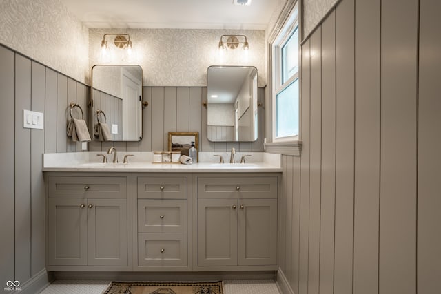 7105 Sylvan Ridge Rd, Indianapolis, IN 46240 - bathroom with double vanity and baseboards