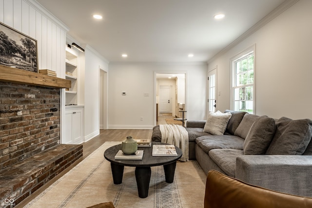 7105 Sylvan Ridge Rd, Indianapolis, IN 46240 - living area featuring crown molding, recessed lighting, light wood-type flooring, and baseboards