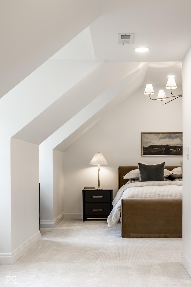 7105 Sylvan Ridge Rd, Indianapolis, IN 46240 - bedroom featuring carpet flooring, vaulted ceiling, a chandelier, and baseboards