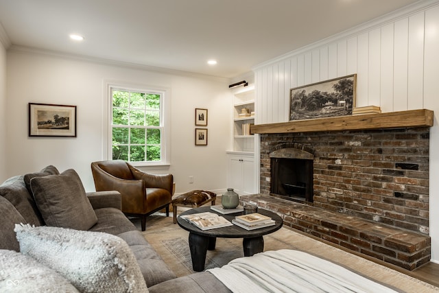 7105 Sylvan Ridge Rd, Indianapolis, IN 46240 - living room with ornamental molding, a fireplace, built in features, baseboards, and wood finished floors