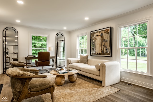 7105 Sylvan Ridge Rd, Indianapolis, IN 46240 - living room featuring crown molding, baseboards, wood finished floors, and recessed lighting
