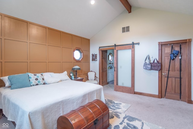 505 Jones Pl, Martinsville, IN 46151 - bedroom with light colored carpet, high vaulted ceiling, a barn door, beamed ceiling, and connected bathroom