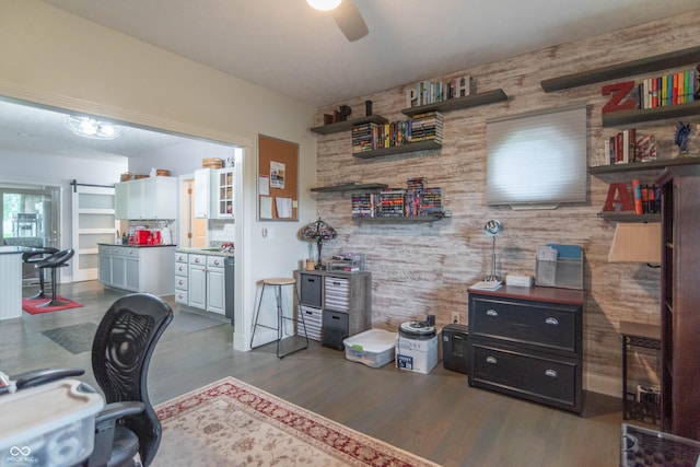 505 Jones Pl, Martinsville, IN 46151 - office with a ceiling fan, wood finished floors, wooden walls, and an accent wall