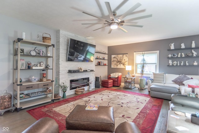 505 Jones Pl, Martinsville, IN 46151 - living area with wood finished floors, a ceiling fan, and a fireplace