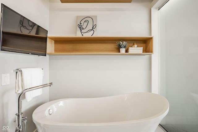 630 N College Ave Unit 409, Indianapolis, IN 46204 - full bath with a freestanding bath