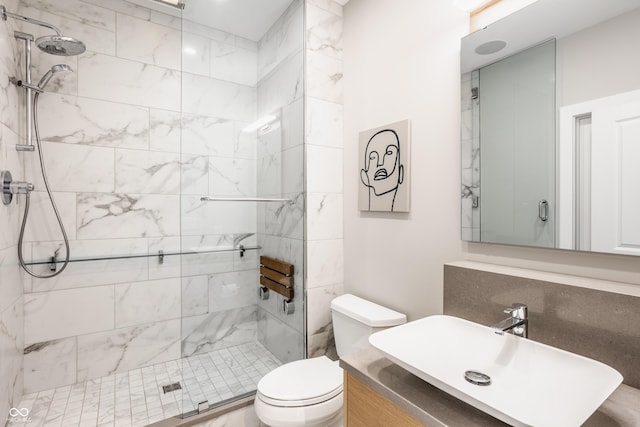 630 N College Ave Unit 409, Indianapolis, IN 46204 - bathroom with a shower stall, toilet, and vanity