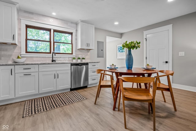 2537 N Boehning St, Indianapolis, IN 46219 - kitchen with dishwasher, a sink, electric panel, tasteful backsplash, and recessed lighting