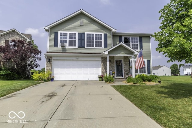 2786 Longleaf Dr, Greenwood, IN 46143 - traditional-style home featuring an attached garage, a front lawn, concrete driveway, and brick siding