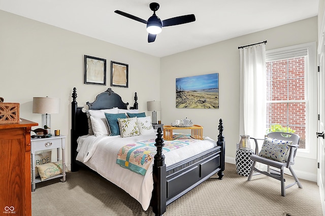 1135 Maclaren Ct, Franklin, IN 46131 - bedroom featuring light carpet, multiple windows, and a ceiling fan