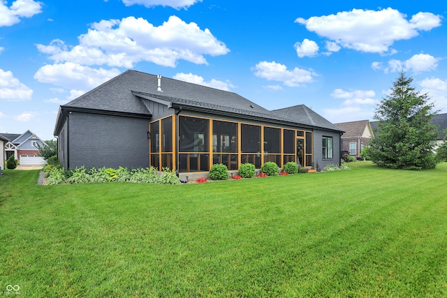 1135 Maclaren Ct, Franklin, IN 46131 - rear view of property featuring a sunroom, a lawn, a shingled roof, and brick siding