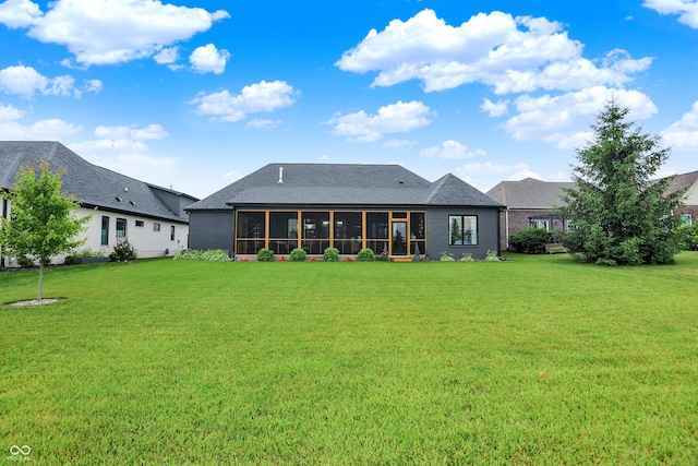 1135 Maclaren Ct, Franklin, IN 46131 - rear view of house with a sunroom, a lawn, and a shingled roof