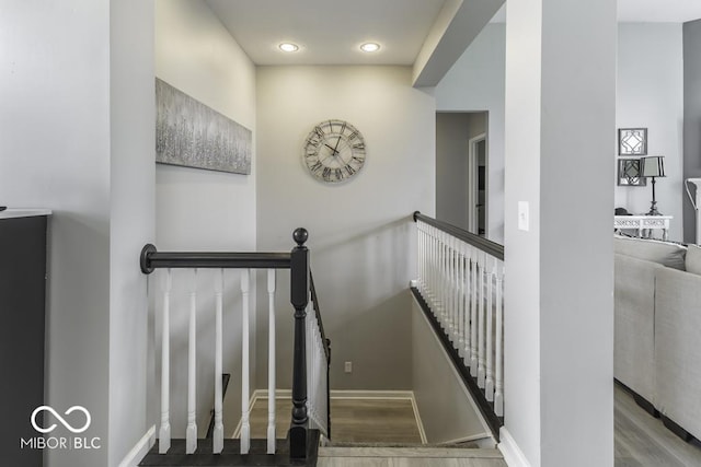 2502 Colinbrook Pkwy, Greenwood, IN 46143 - stairs featuring wood finished floors, baseboards, and recessed lighting