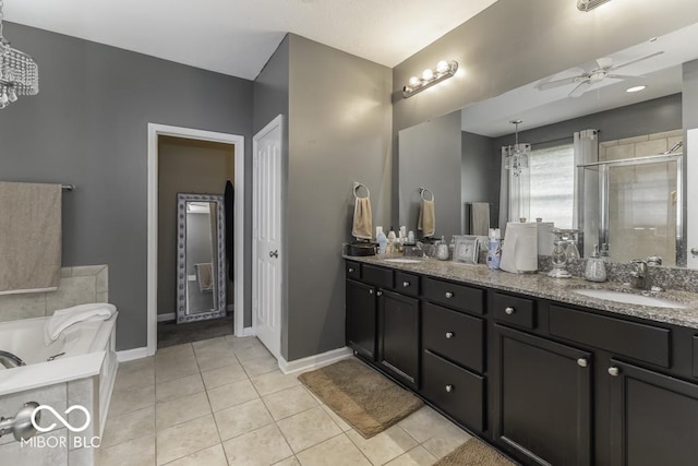 2502 Colinbrook Pkwy, Greenwood, IN 46143 - bathroom featuring a ceiling fan, double vanity, a stall shower, and a garden tub