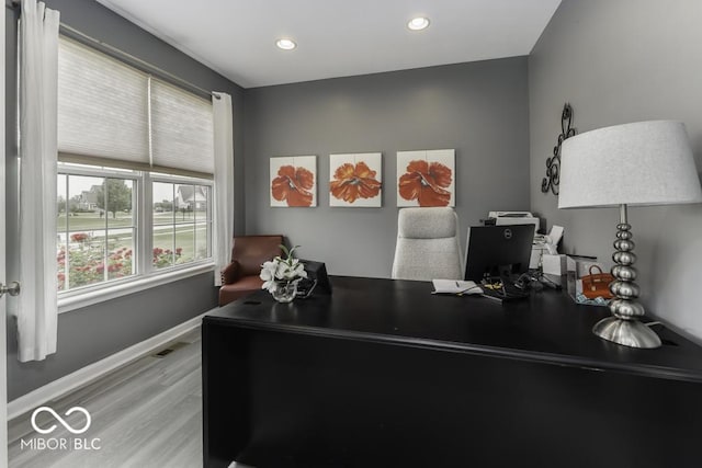 2502 Colinbrook Pkwy, Greenwood, IN 46143 - home office featuring wood finished floors, baseboards, and recessed lighting