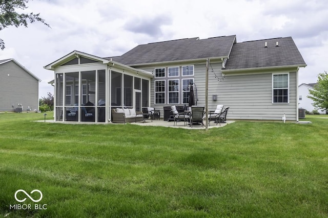2502 Colinbrook Pkwy, Greenwood, IN 46143 - rear view of house featuring a lawn, a sunroom, outdoor lounge area, and a patio area