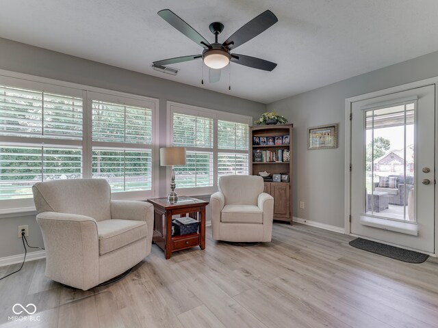 5351 Abbington Ave, Plainfield, IN 46168 - sitting room with healthy amount of natural light, light wood-type flooring, and a ceiling fan