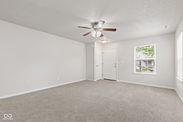 1903 Windy Hill Ln, Indianapolis, IN 46239 - empty room featuring carpet floors, a ceiling fan, and a textured ceiling