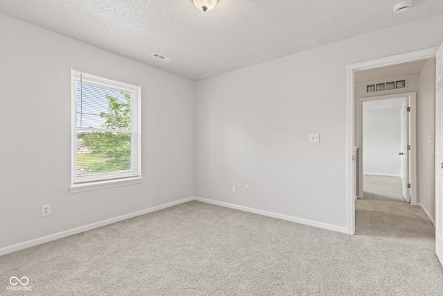 1903 Windy Hill Ln, Indianapolis, IN 46239 - carpeted empty room featuring a smoke detector and a textured ceiling