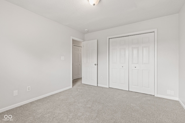 1903 Windy Hill Ln, Indianapolis, IN 46239 - unfurnished bedroom featuring carpet and a closet