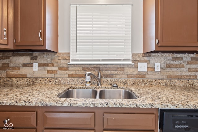 1903 Windy Hill Ln, Indianapolis, IN 46239 - kitchen featuring decorative backsplash and light stone counters