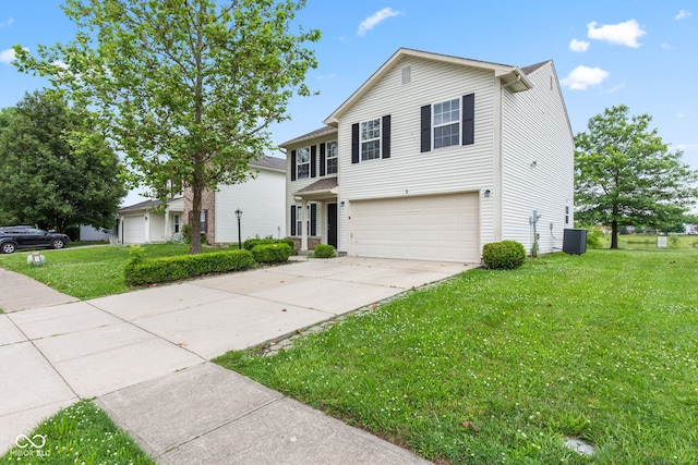 1903 Windy Hill Ln, Indianapolis, IN 46239 - traditional home featuring an attached garage, concrete driveway, and a front lawn