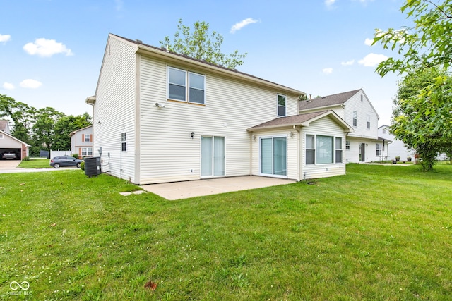 1903 Windy Hill Ln, Indianapolis, IN 46239 - back of house with a patio area and a yard