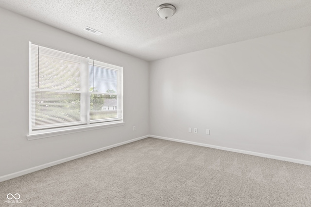 1903 Windy Hill Ln, Indianapolis, IN 46239 - unfurnished room with a textured ceiling and carpet floors