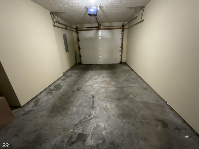 2853 S Walnut Street Pike, Bloomington, IN 47401 - garage featuring a garage door opener and electric panel