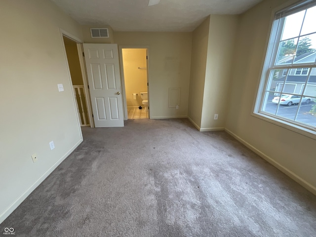 2853 S Walnut Street Pike, Bloomington, IN 47401 - unfurnished room with carpet flooring and plenty of natural light