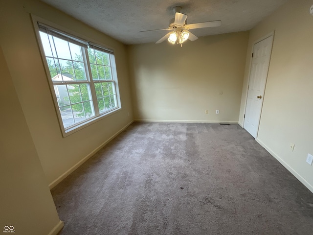 2853 S Walnut Street Pike, Bloomington, IN 47401 - carpeted spare room with ceiling fan and a textured ceiling
