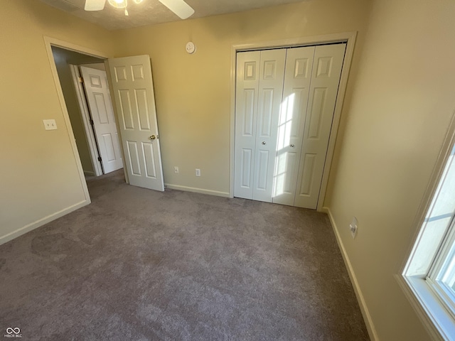 2853 S Walnut Street Pike, Bloomington, IN 47401 - unfurnished bedroom with carpet floors, a closet, and a ceiling fan