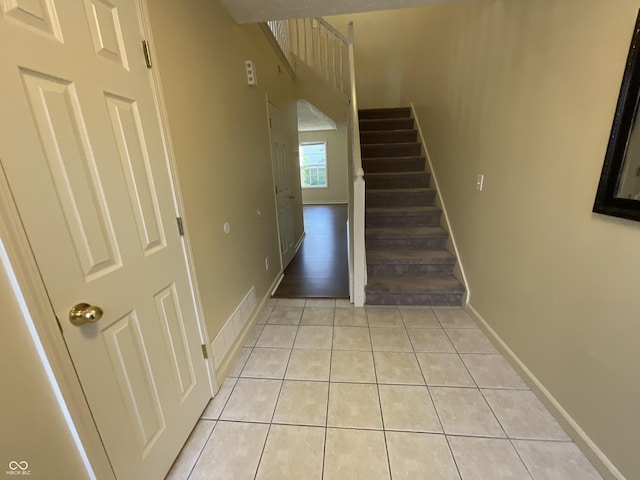 2853 S Walnut Street Pike, Bloomington, IN 47401 - stairway featuring tile patterned floors and baseboards
