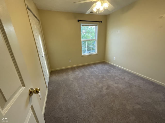 2853 S Walnut Street Pike, Bloomington, IN 47401 - unfurnished bedroom with carpet floors, a ceiling fan, and a closet