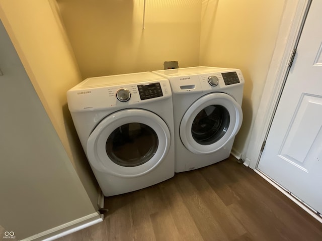 2853 S Walnut Street Pike, Bloomington, IN 47401 - washroom featuring independent washer and dryer and dark wood finished floors