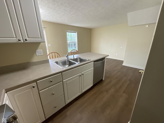 2853 S Walnut Street Pike, Bloomington, IN 47401 - kitchen with dishwasher, a peninsula, a textured ceiling, dark wood-style floors, and white cabinetry