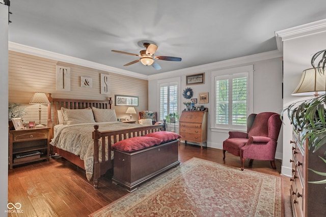 900 W Busby St, Lebanon, IN 46052 - bedroom featuring crown molding, wood finished floors, a ceiling fan, and wooden walls