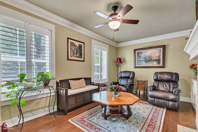 900 W Busby St, Lebanon, IN 46052 - living area featuring ceiling fan, wood-type flooring, and crown molding