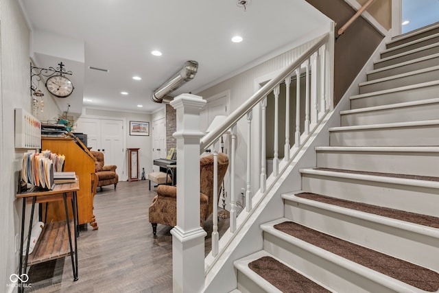900 W Busby St, Lebanon, IN 46052 - stairway featuring wood finished floors, crown molding, and recessed lighting