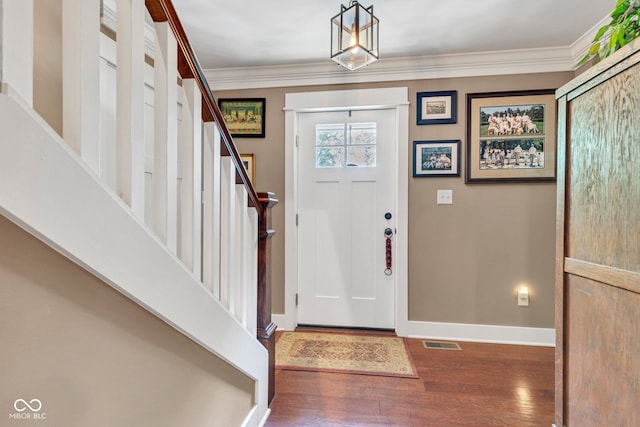 900 W Busby St, Lebanon, IN 46052 - entrance foyer with wood finished floors, crown molding, and stairs