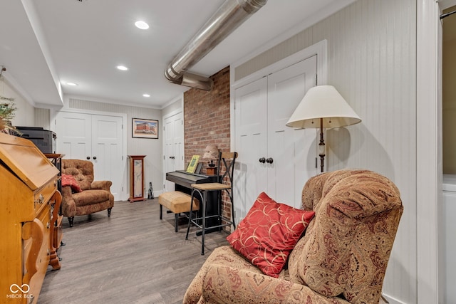 900 W Busby St, Lebanon, IN 46052 - sitting room with wood finished floors, ornamental molding, and recessed lighting