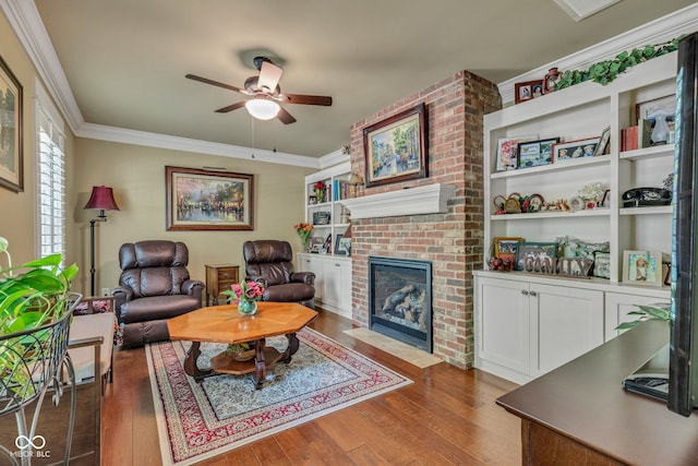 900 W Busby St, Lebanon, IN 46052 - living room with hardwood / wood-style floors, ceiling fan, a fireplace, and ornamental molding